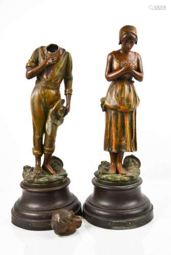 A pair of painted spelter figurines, 'Angelus Par A de Ranieri, the other A/F. 43cms tall