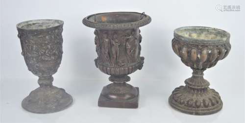A classical form urn and two goblets. 20cm