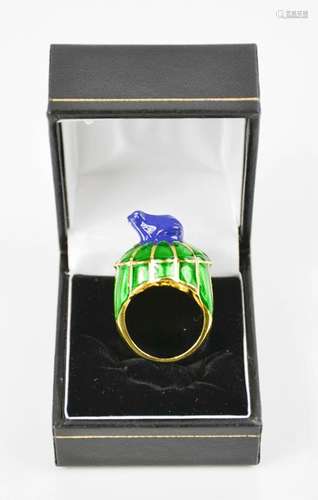 A blue and green enamelled dress ring, with a frog form finial, size M, 14.35g.