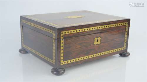 A 19th century rosewood sewing box. 13cm x 27cm x 23cm