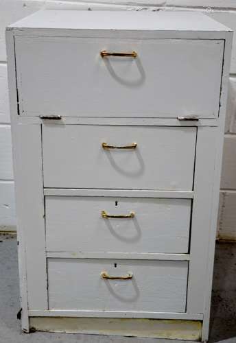 A wooden painted cabinet with drop down cupboard door and drawers below.