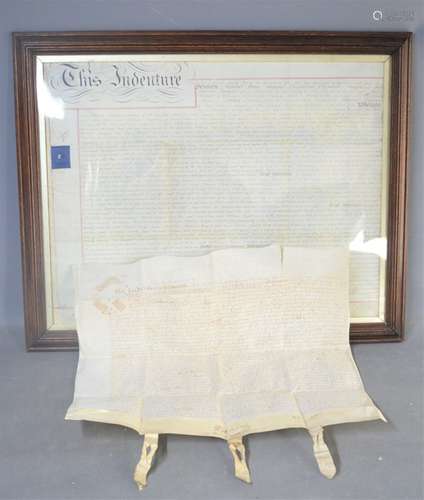 A 19th century framed indenture together with a 17th century example