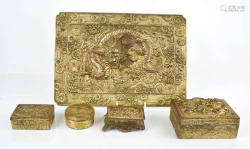 A group of gilt metal Chinese trinket boxes, embossed with decoration, together with a tray
