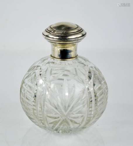 A cut glass and white metal rosewater flagon, 14cm high.