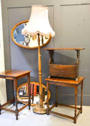 An oak standard lamp, two oak occasional tables, a magazine rack and two oval mirrors