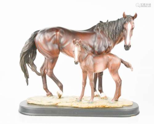 A resin study of horse and foal, stamped with Chinese symbol, 35cm high.