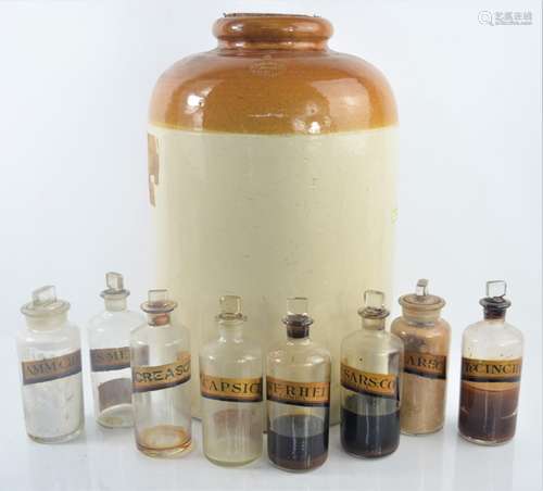 A Group of vintage apothecary jars with labels together with a Doulton Lambeth stoneware glazed jar,