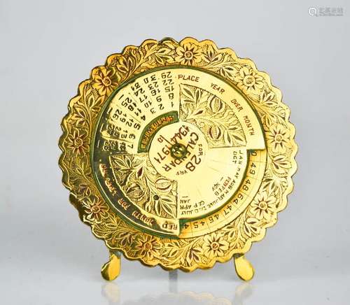 A brass desk calendar 'For 28 Yrs, 1944 to 1971', 11cm high.