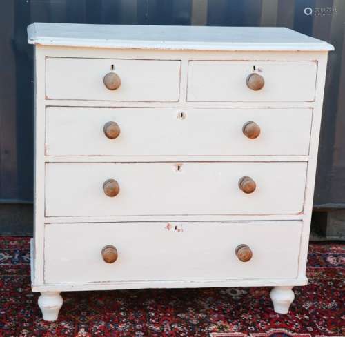 A pine Victorian chest of drawers with two short over three long graduated drawers, painted cream,