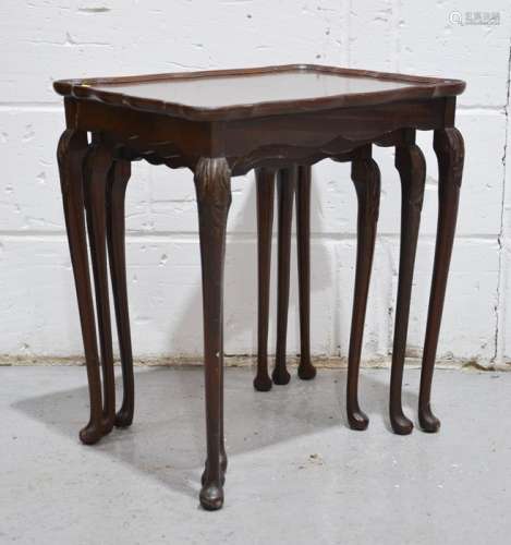 A nest of three mahogany tables, 56 by 50 by 39cm.