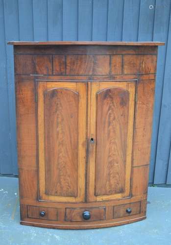 A Victorian mahogany wall hanging corner cupboard