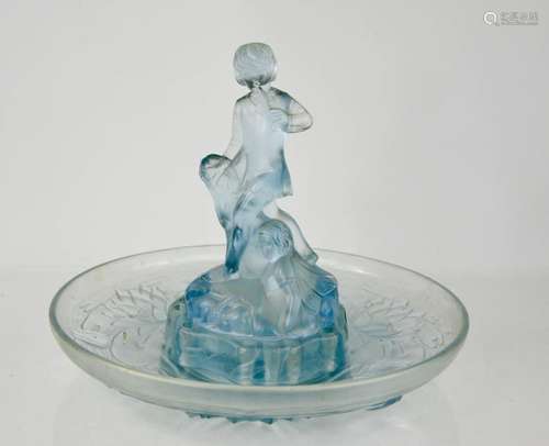 A Walther Sohne pale blue vaseline glass Art Deco flower frog and bowl, modelled to depict Peter Pan