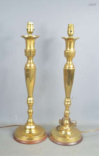 A pair of brass Art Deco style table lamps with shades, 56cms tall, together with 2 Victorian copper