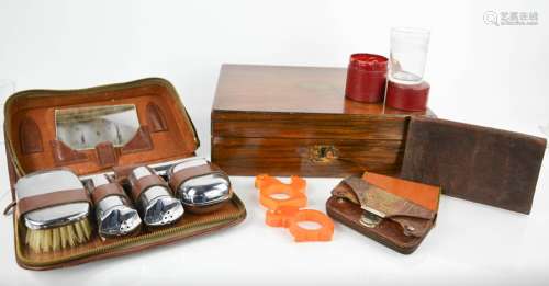 A vintage leather clad toddy glass case, a leather cigarette case, gents travelling set, and