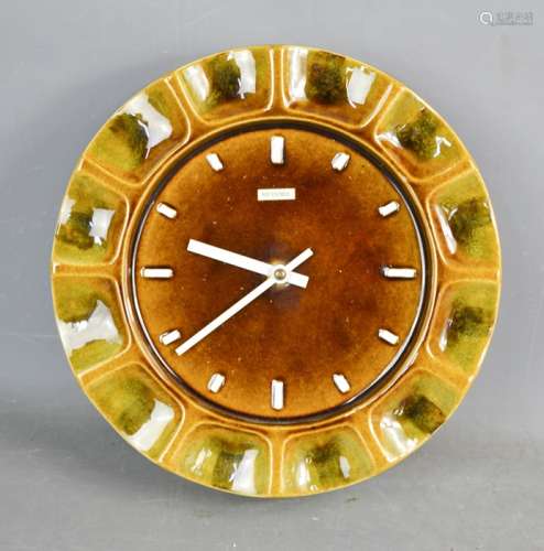 A vintage Metamec ceramic wall clock