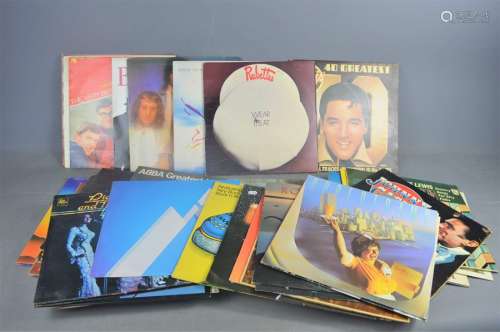 A group of LP records to include: Elvis Presley, Roxy music, Bee Gees, Supertramp, 10cc, Abba, The