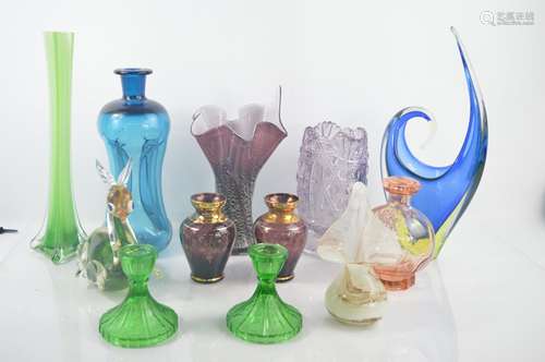 A group of vintage glassware, included coloured vases, bowls and other examples.