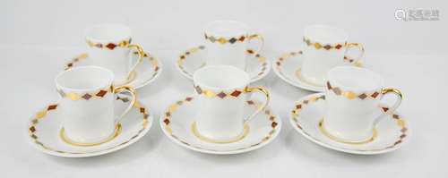 An Yves Saint Laurent set of six coffee cans and saucers