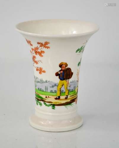 A 19th century bud vase, depicting figure in landscape. 12.5cms tall x 10cms diameter on the rim