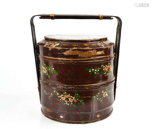 A Chinese early 20th century hand painted wedding basket, depicting flowers on a red ground, 23cm