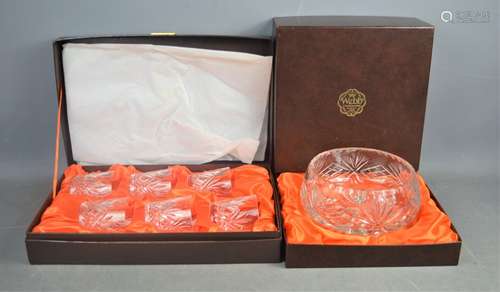 A boxed set of six crystal tumblers together with a boxed crystal bowl