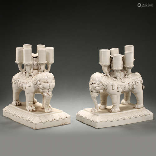 A PAIR OF CHINESE DING WARE ELEPHANT LAMPSTANDS