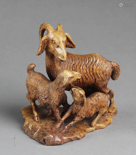 A Carved Stone Goat Figurine