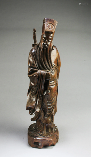 A Carved Hardwood Figurine