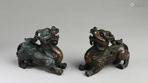 A Pair of Chinese Bronze Mythical Beast Figurines