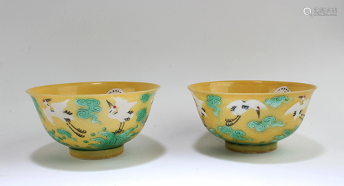 A Pair of Famille Jaune Bowls