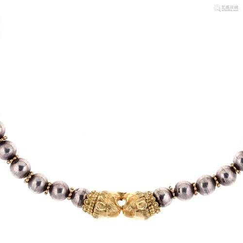 ZOLOTAS Collier figurant deux têtes de lions affro…