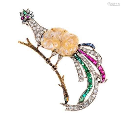 Broche “Oiseau de Paradis” en or, le corps est con…