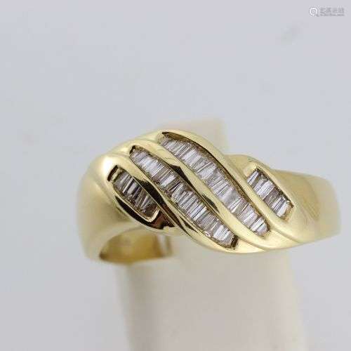 Bague en or sertie de diamants baguettes Poids bru…