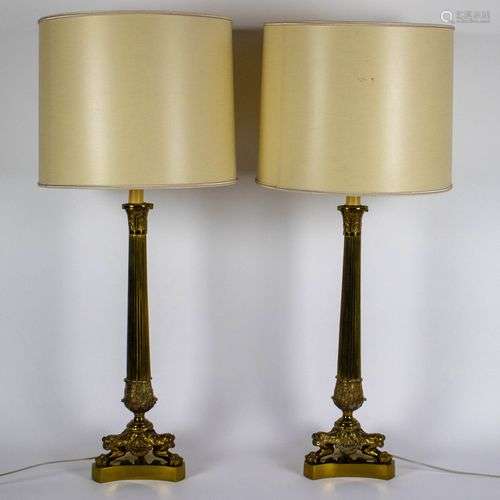 A pair of lamps with bronze feet
