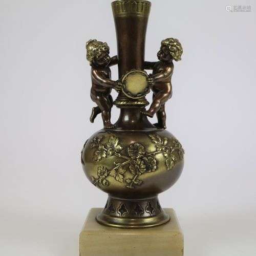 Bronze vase with putti