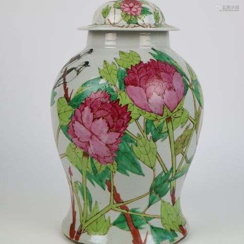 A Chinese vase with floral design and cover