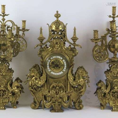 An imposing ormolu mantelpiece with candlesticks