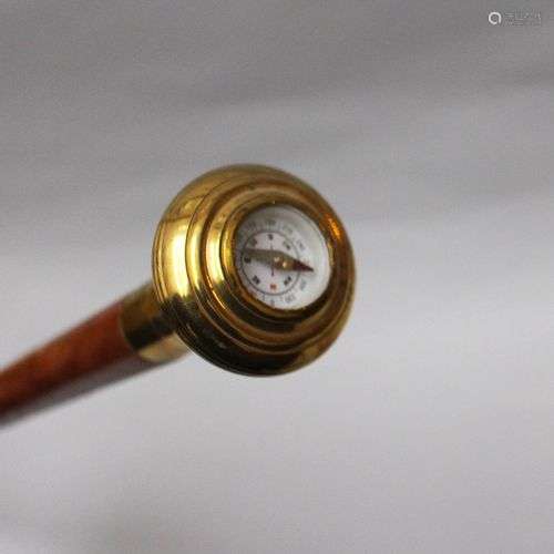 Walking stick with compass , bronze , polished on …