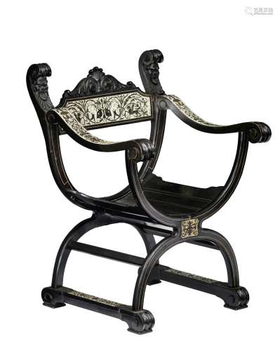 A Renaissance Revival Dante chair, decorated with a bone inlaid decoration of grotesques, in the man