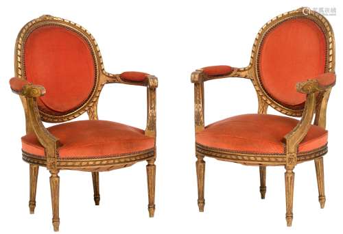 A pair of gilt wooden Louis XVI style Napoleon III 'fauteuils en cabriolet', the second half of the