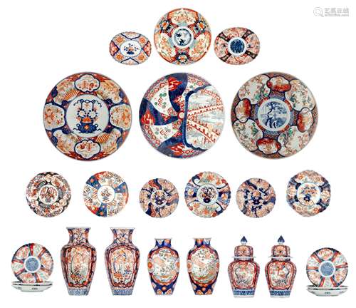 Six Japanese Imari floral decorated vases and four ditto chargers, the panels decorated with various