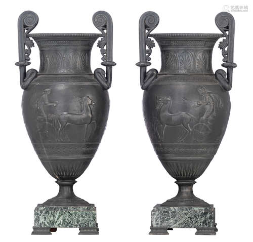 A pair of Ancient Greek style vases, decorated with palmettes and a basso-relievo frieze of a chario