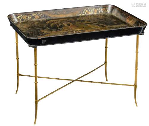 A Napoleon III tea table, the top with a lacquered chinoiserie scene of figures in a landscape, on b