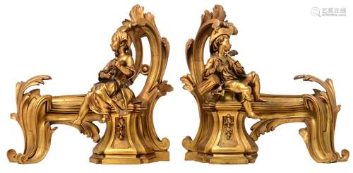 A pair of gilt bronze Napoleon III andirons, decorated with a boy and a girl playing music, H 36 cm