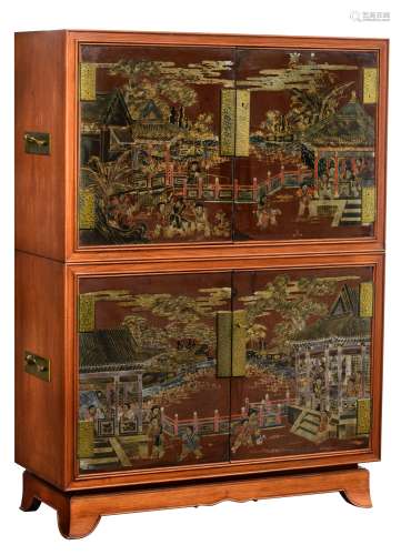 A Chinese inspired rosewood veneered cabinet, the doors decorated with chinoiseries, H 156 - W 113ÿ