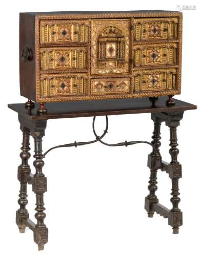 An exceptional Baroque and Moorish inspired Spanish vargue¤o, decorated with richly carved and gilt