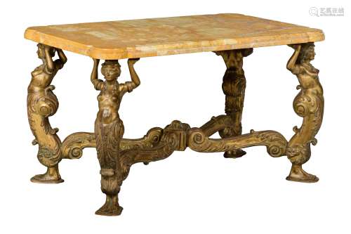 A Baroque style gilt wooden centre table with a yellow Sienna marble top, resting on four caryatides