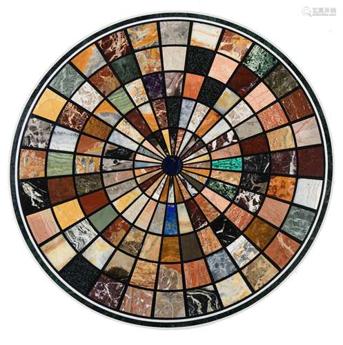 A round tabletop in Italian pietra dura, decorated with geometric motifs in various types of marble,