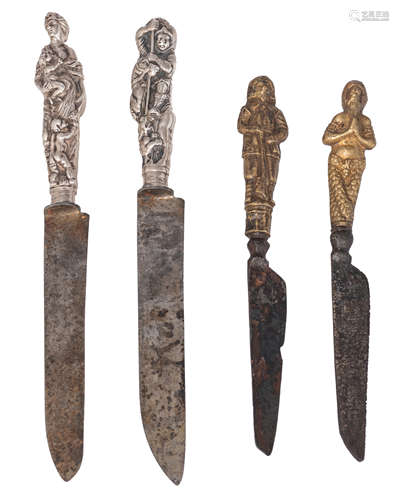 A pair of Dutch knives, the gilt brass handles showing Neptune and a hunter with his dog, both marke