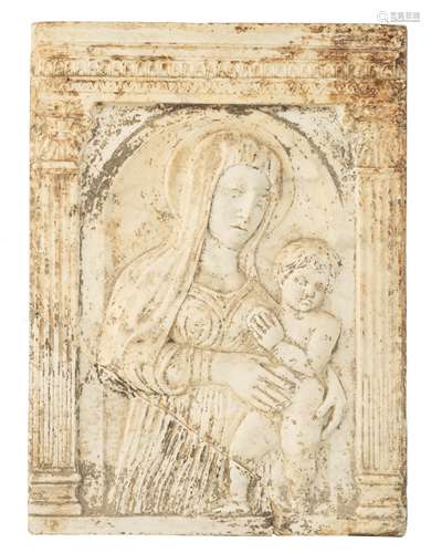 A Renaissance Carrara marble bas-relief architectural fragment depicting the Madonna and Child, sign